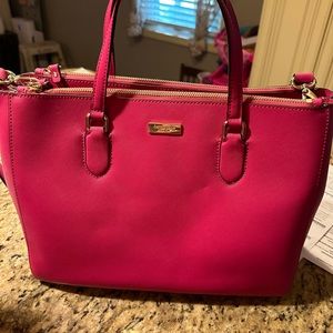 NWT Kate Spade Pink Bag for sale with separate compartments inside.